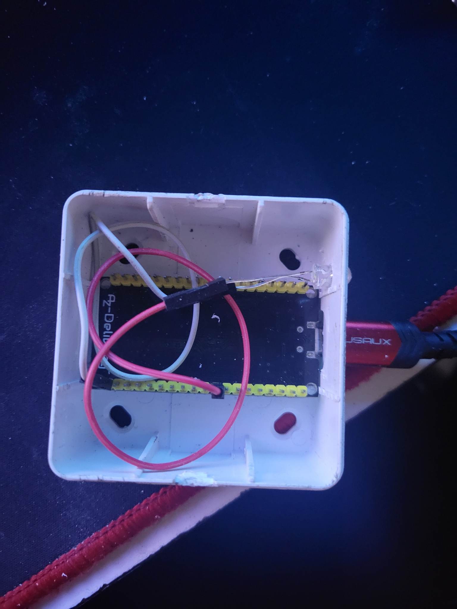 Open Smart Unlock prototype enclosure with the ESP32, status LED and wiring